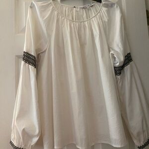 Elegant White Blouse with Black Accents on Peasant Sleeves